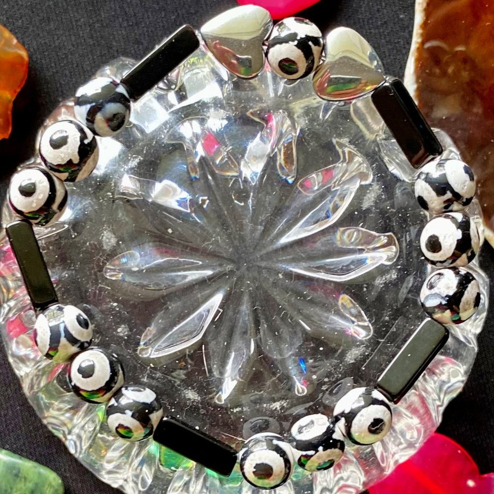 Black Onyx precious stones with 2 silver in color HEART Bracelet